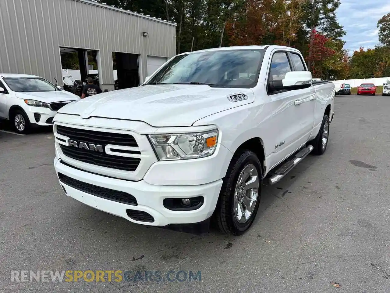 1 Photograph of a damaged car 1C6RREBT8MN709356 RAM 1500 2021