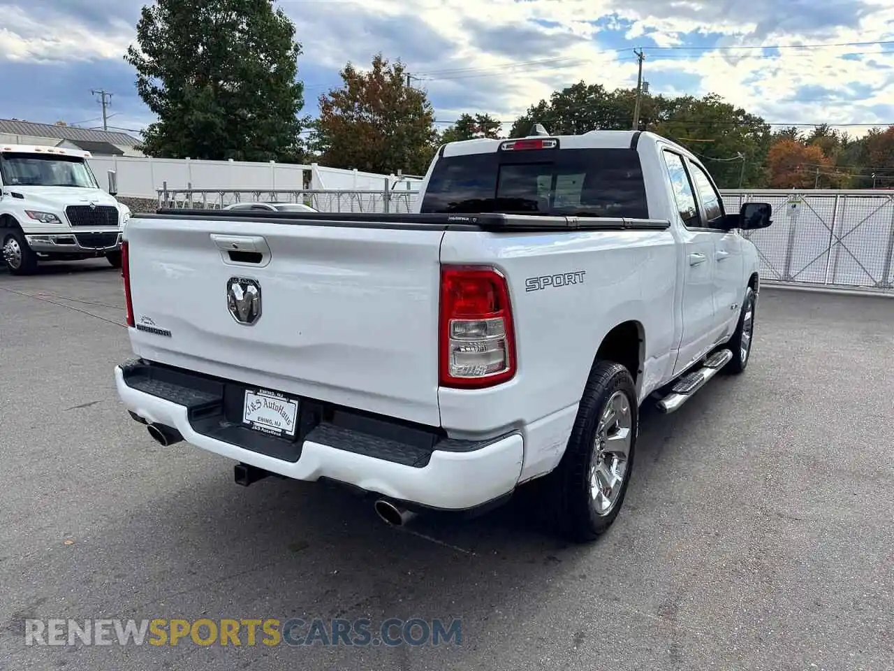 3 Photograph of a damaged car 1C6RREBT8MN709356 RAM 1500 2021