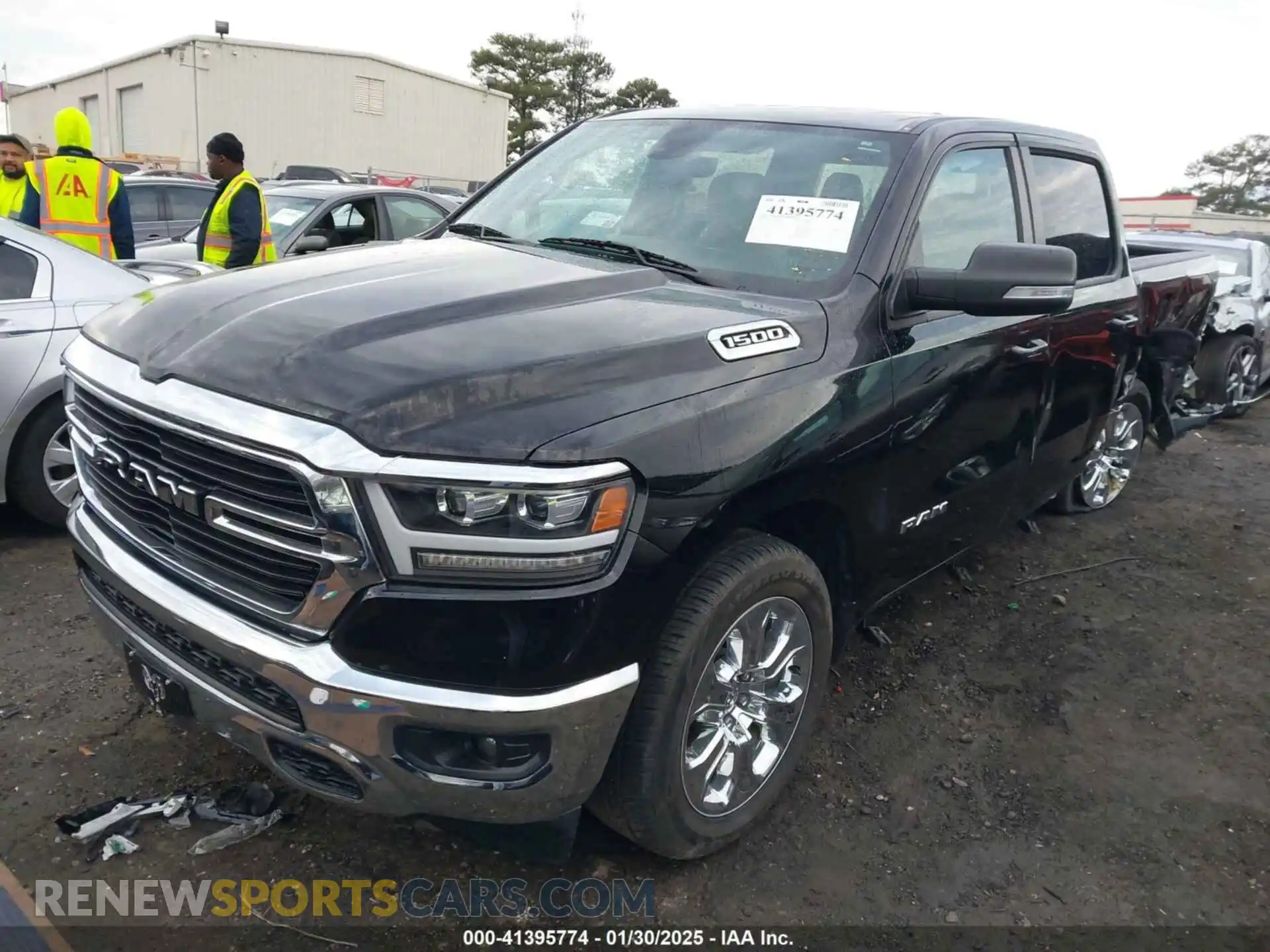 2 Photograph of a damaged car 1C6RREFG1MN532758 RAM 1500 2021