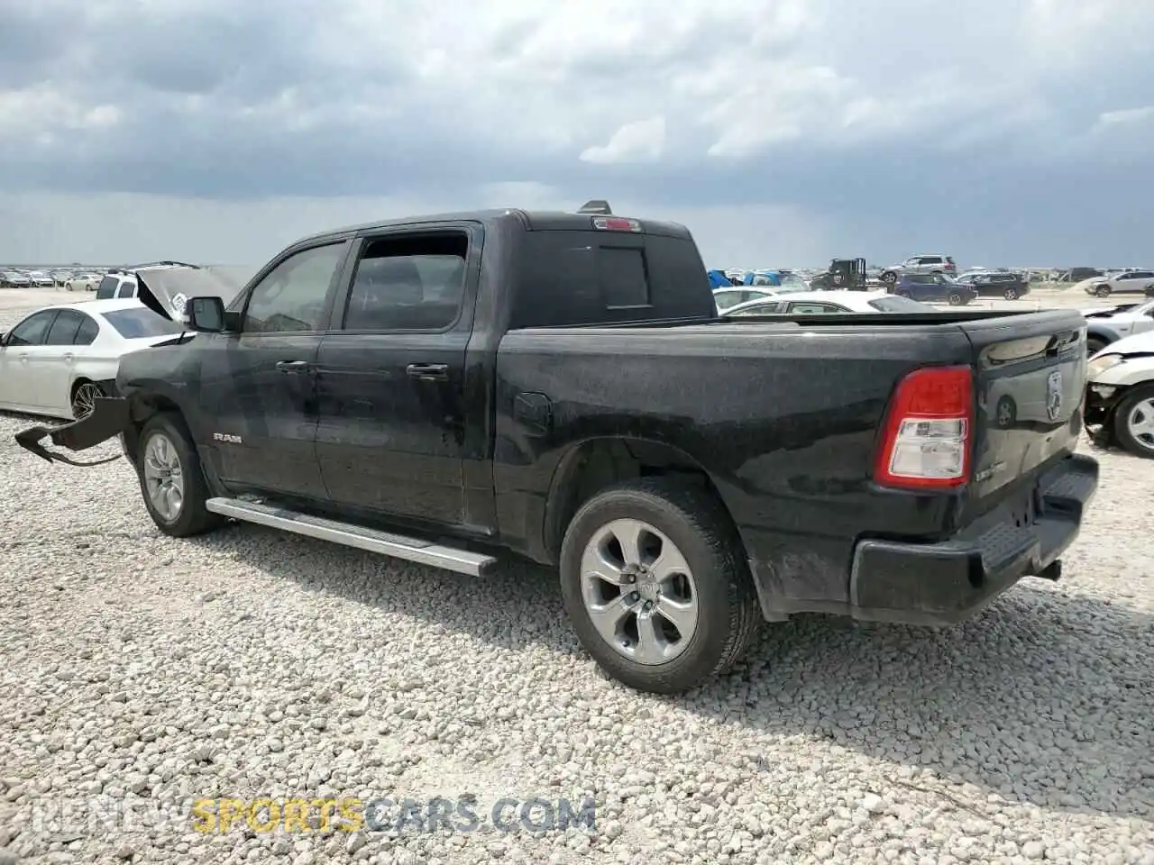 2 Photograph of a damaged car 1C6RREFG3MN768120 RAM 1500 2021