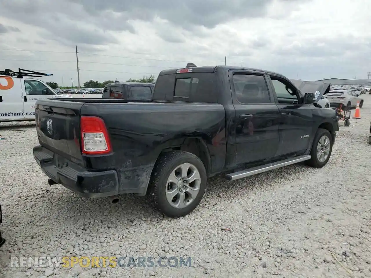 3 Photograph of a damaged car 1C6RREFG3MN768120 RAM 1500 2021