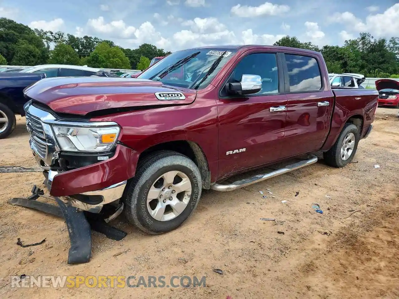 1 Photograph of a damaged car 1C6RREFG4MN630330 RAM 1500 2021