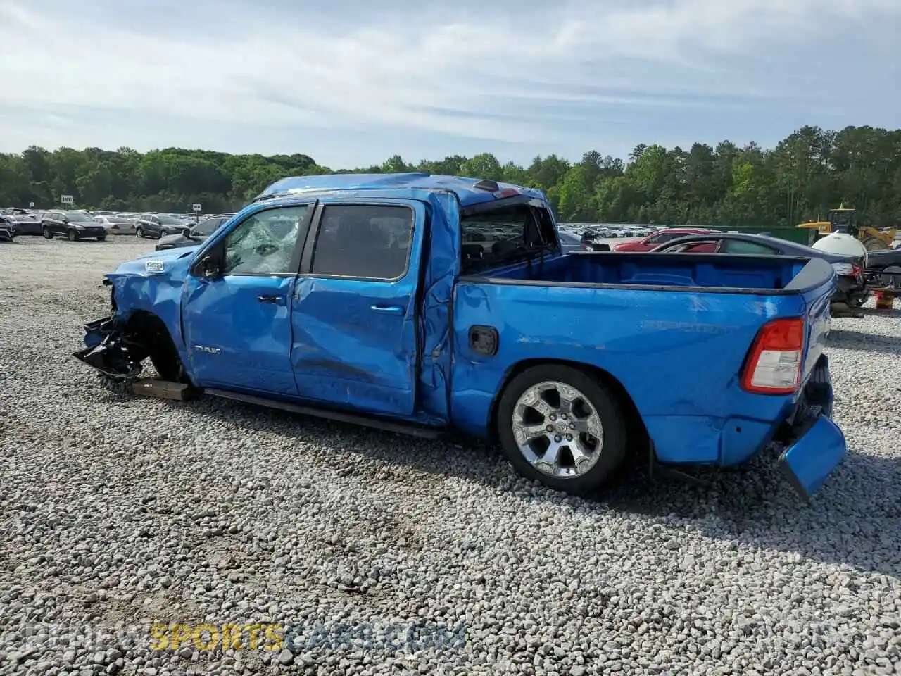 2 Photograph of a damaged car 1C6RREFG4MN801965 RAM 1500 2021