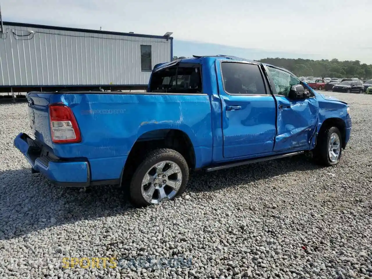 3 Photograph of a damaged car 1C6RREFG4MN801965 RAM 1500 2021