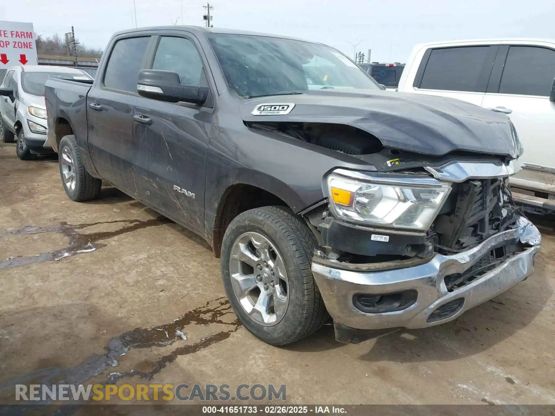 1 Photograph of a damaged car 1C6RREFG5MN802090 RAM 1500 2021