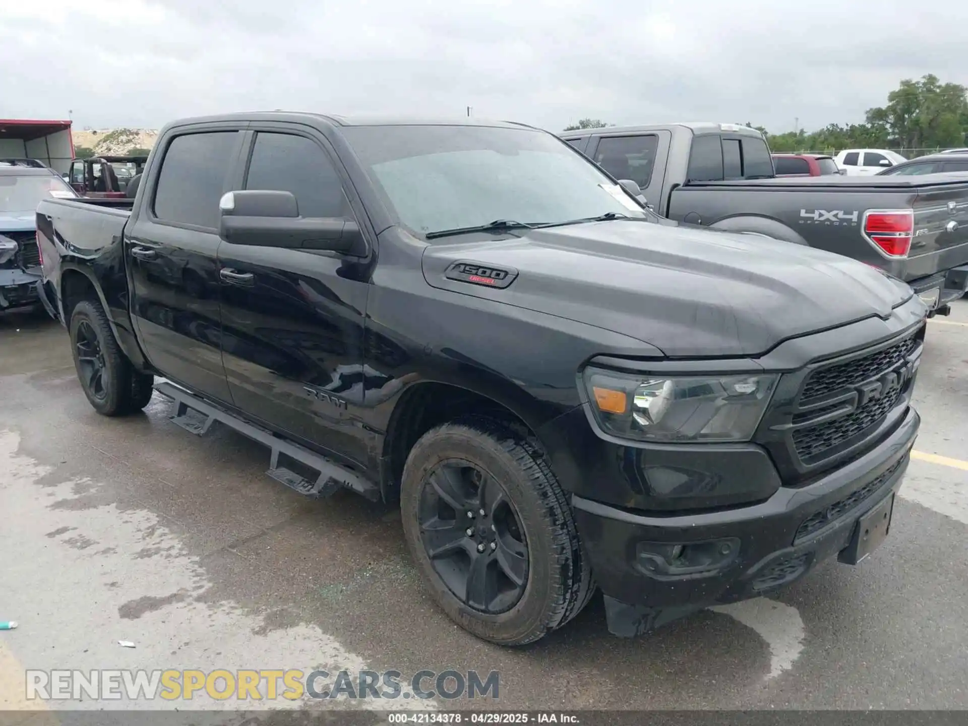 1 Photograph of a damaged car 1C6RREFM3MN835868 RAM 1500 2021