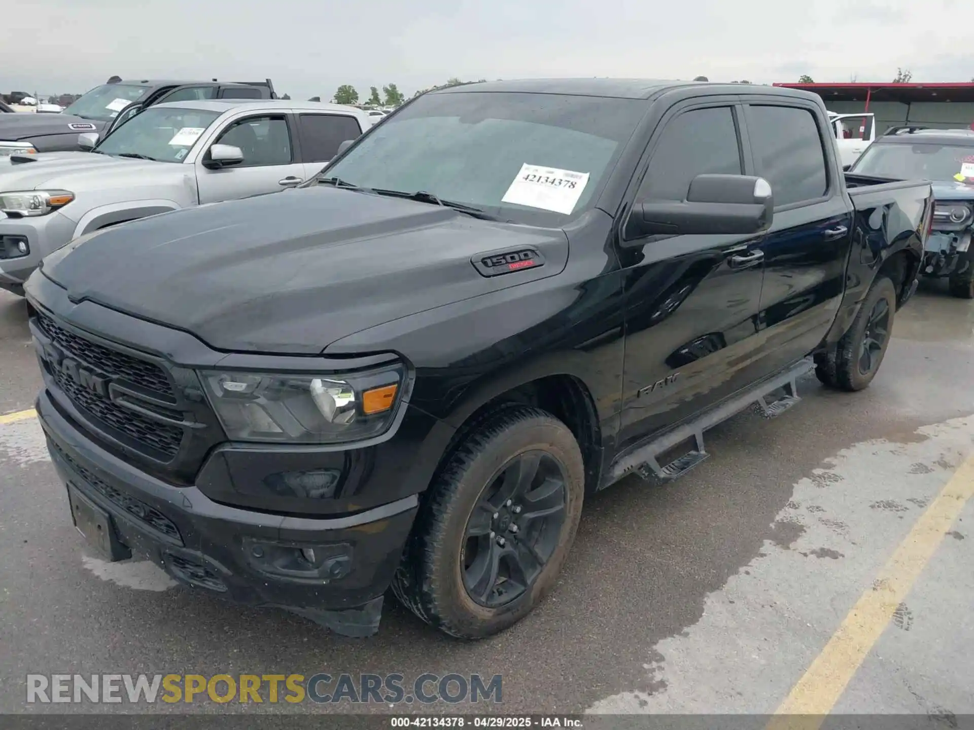2 Photograph of a damaged car 1C6RREFM3MN835868 RAM 1500 2021