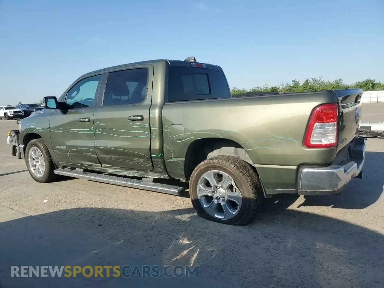 2 Photograph of a damaged car 1C6RREFM8MN630286 RAM 1500 2021
