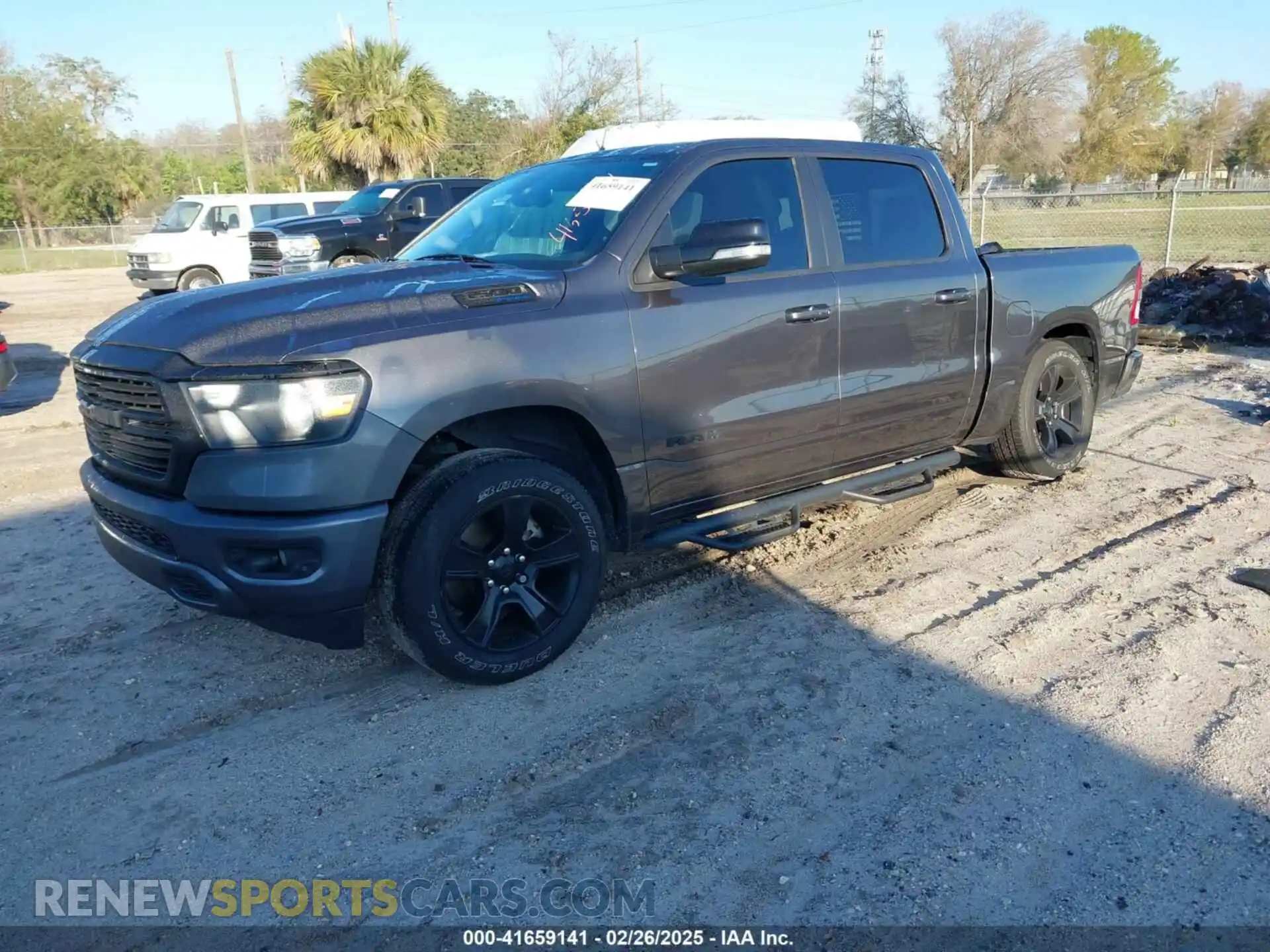 2 Photograph of a damaged car 1C6RREFT0MN629169 RAM 1500 2021
