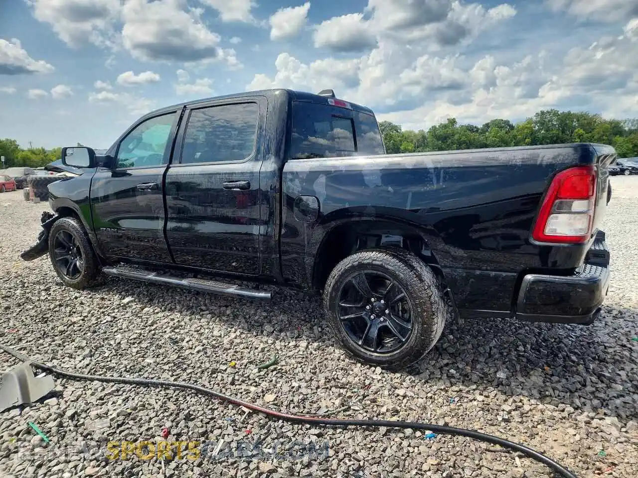 2 Photograph of a damaged car 1C6RREFT1MN593878 RAM 1500 2021