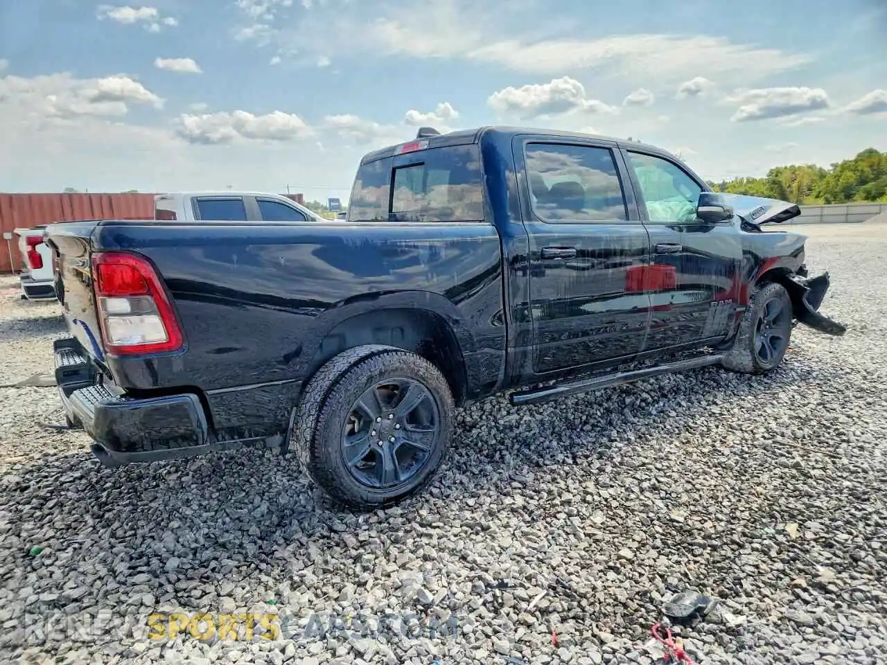 3 Photograph of a damaged car 1C6RREFT1MN593878 RAM 1500 2021