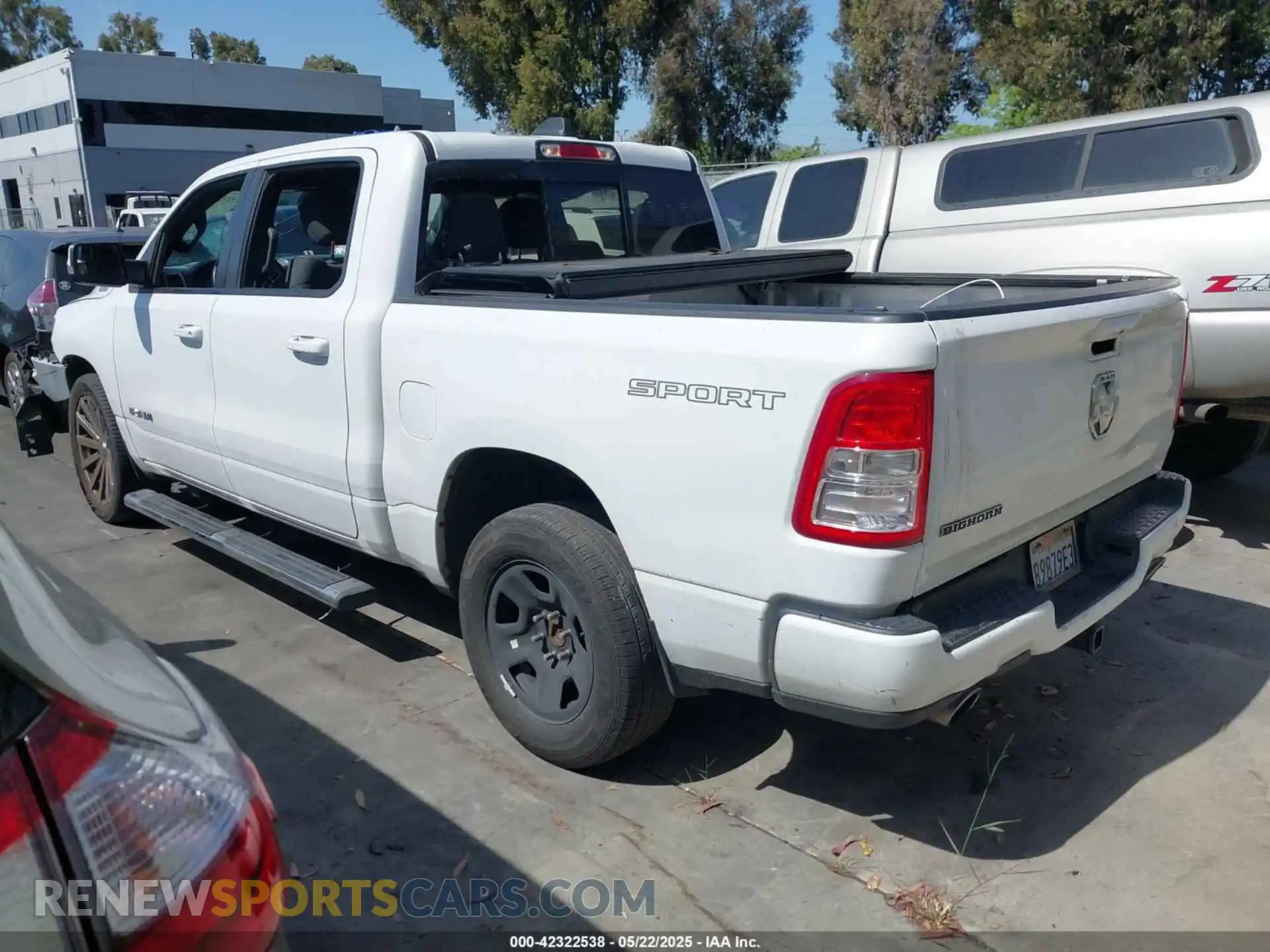 3 Photograph of a damaged car 1C6RREFT1MN608699 RAM 1500 2021