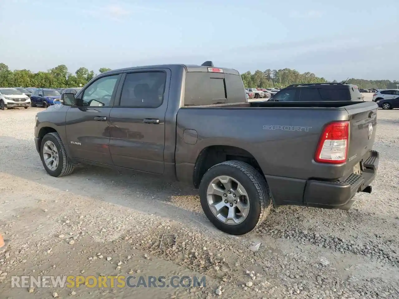 2 Photograph of a damaged car 1C6RREFT1MN630881 RAM 1500 2021