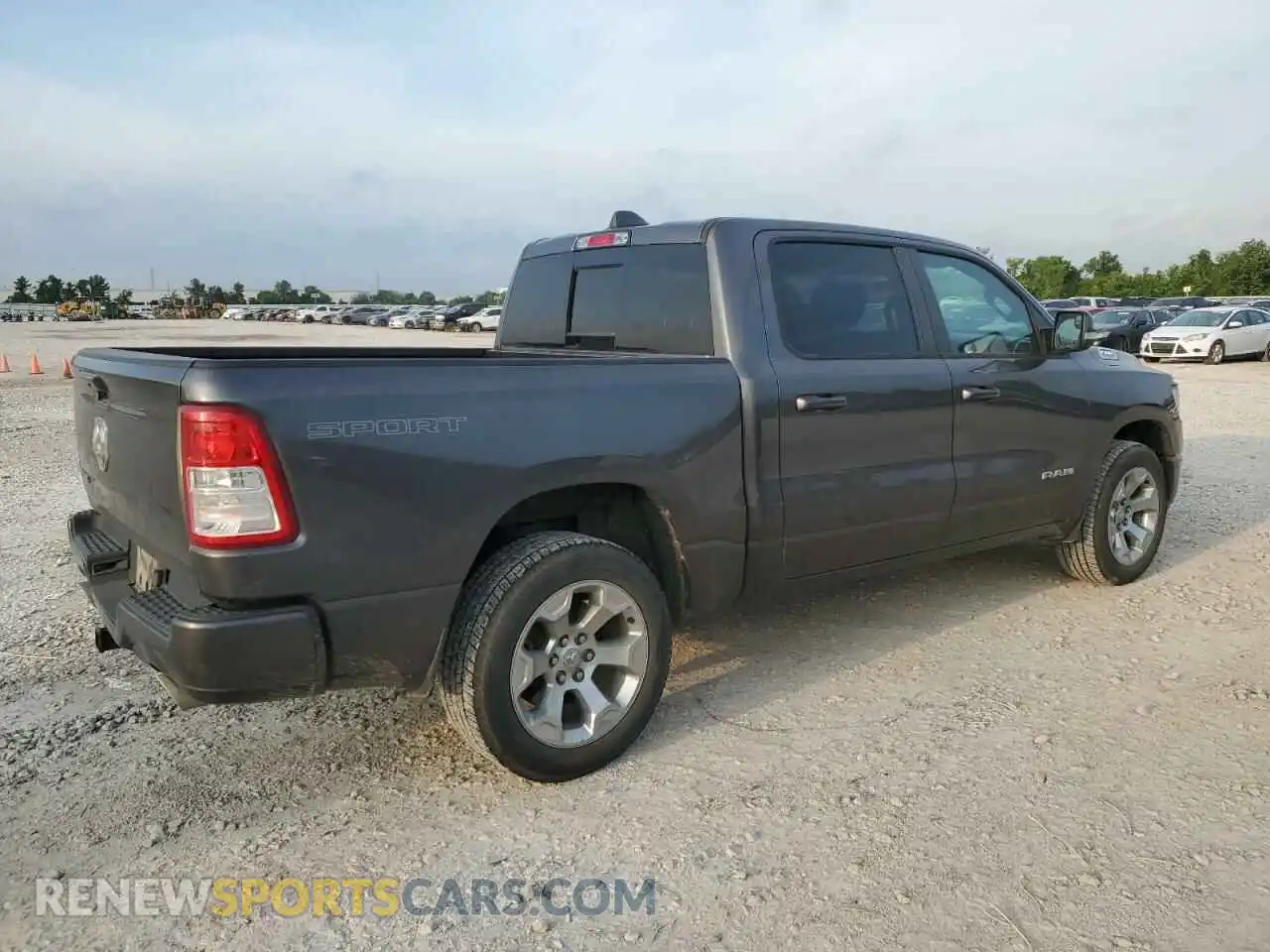 3 Photograph of a damaged car 1C6RREFT1MN630881 RAM 1500 2021