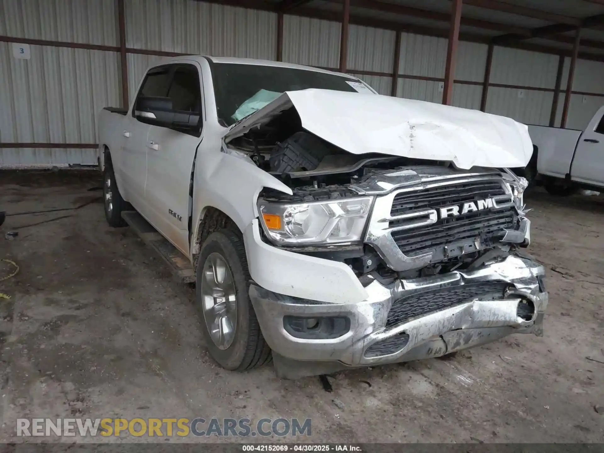 1 Photograph of a damaged car 1C6RREFT1MN646966 RAM 1500 2021