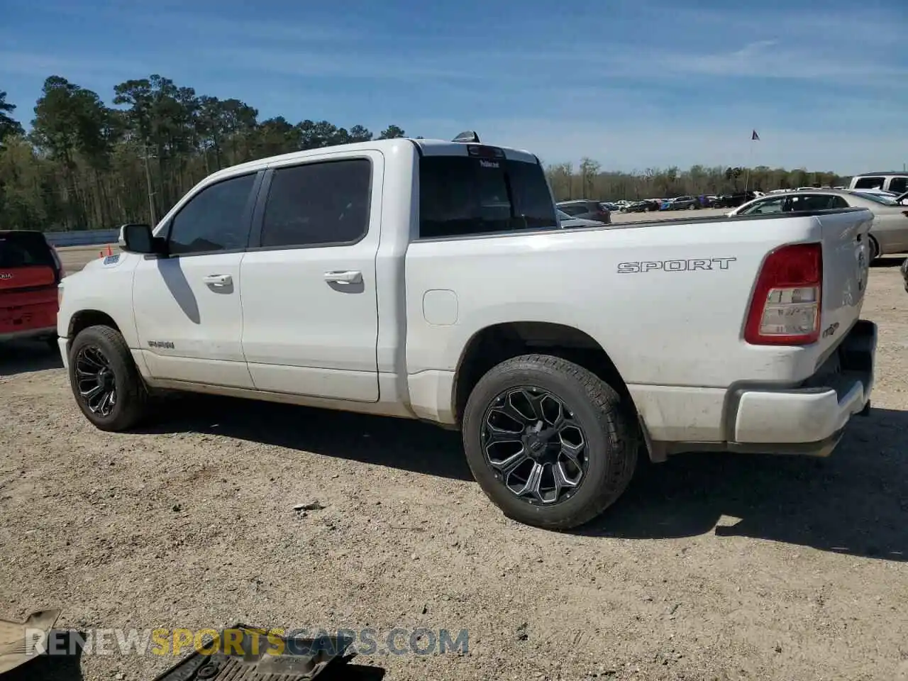 2 Photograph of a damaged car 1C6RREFT1MN653979 RAM 1500 2021
