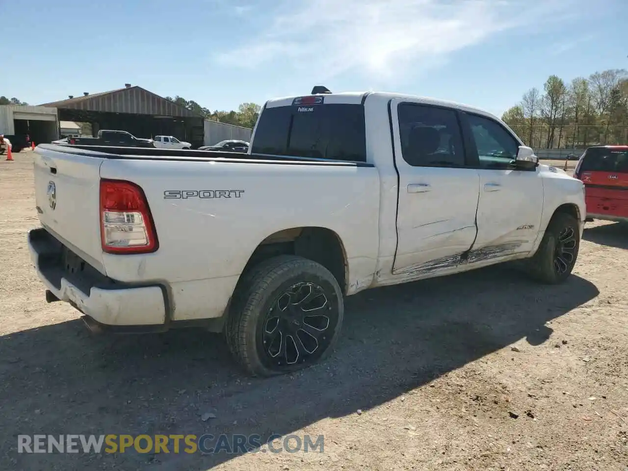 3 Photograph of a damaged car 1C6RREFT1MN653979 RAM 1500 2021