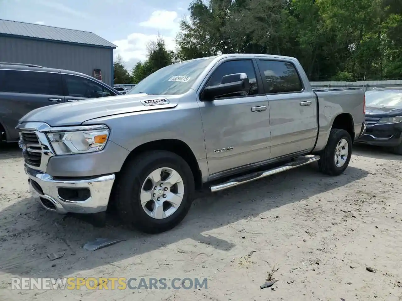 1 Photograph of a damaged car 1C6RREFT1MN660589 RAM 1500 2021