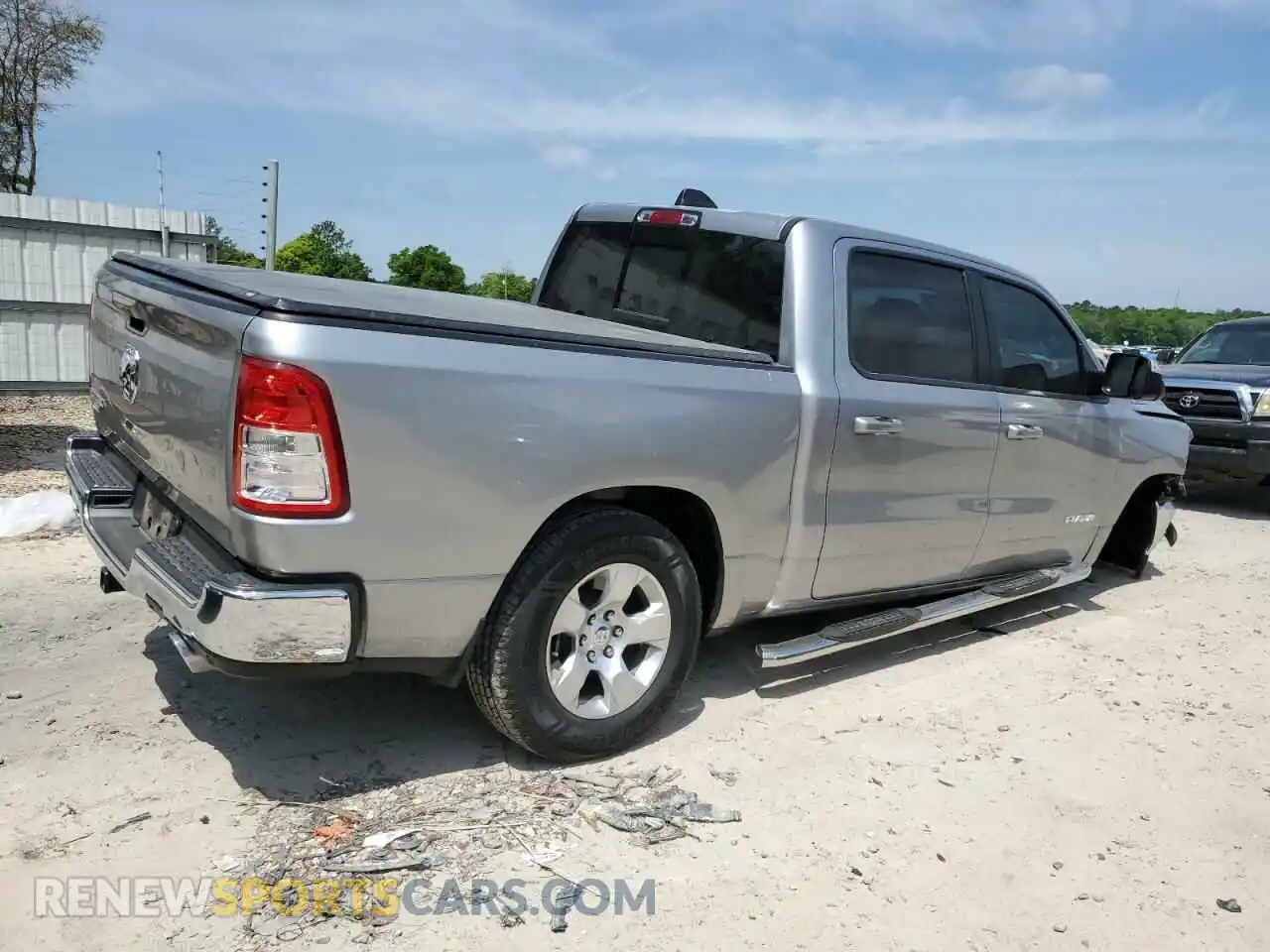 3 Photograph of a damaged car 1C6RREFT1MN660589 RAM 1500 2021