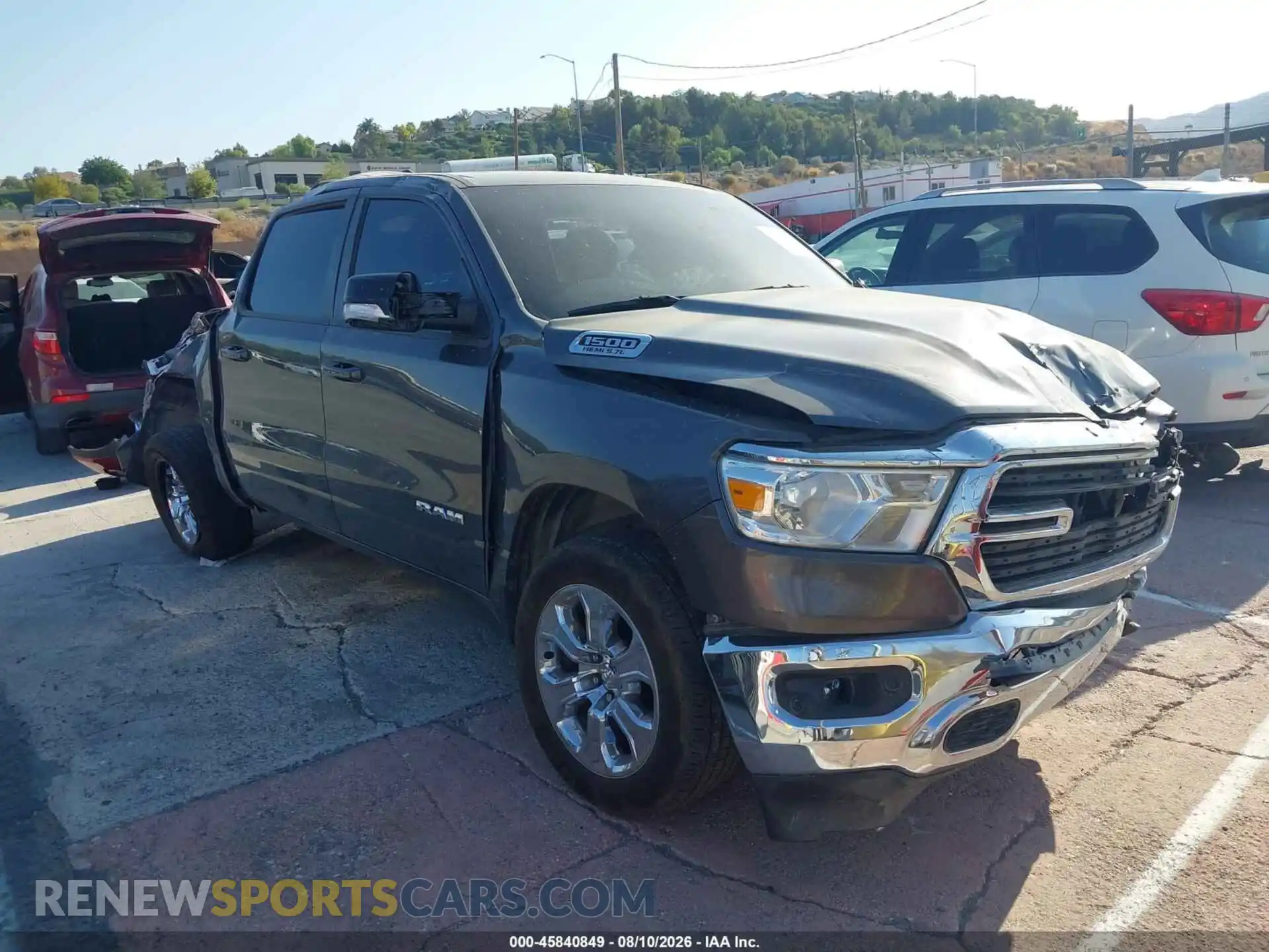 1 Photograph of a damaged car 1C6RREFT2MN502021 RAM 1500 2021