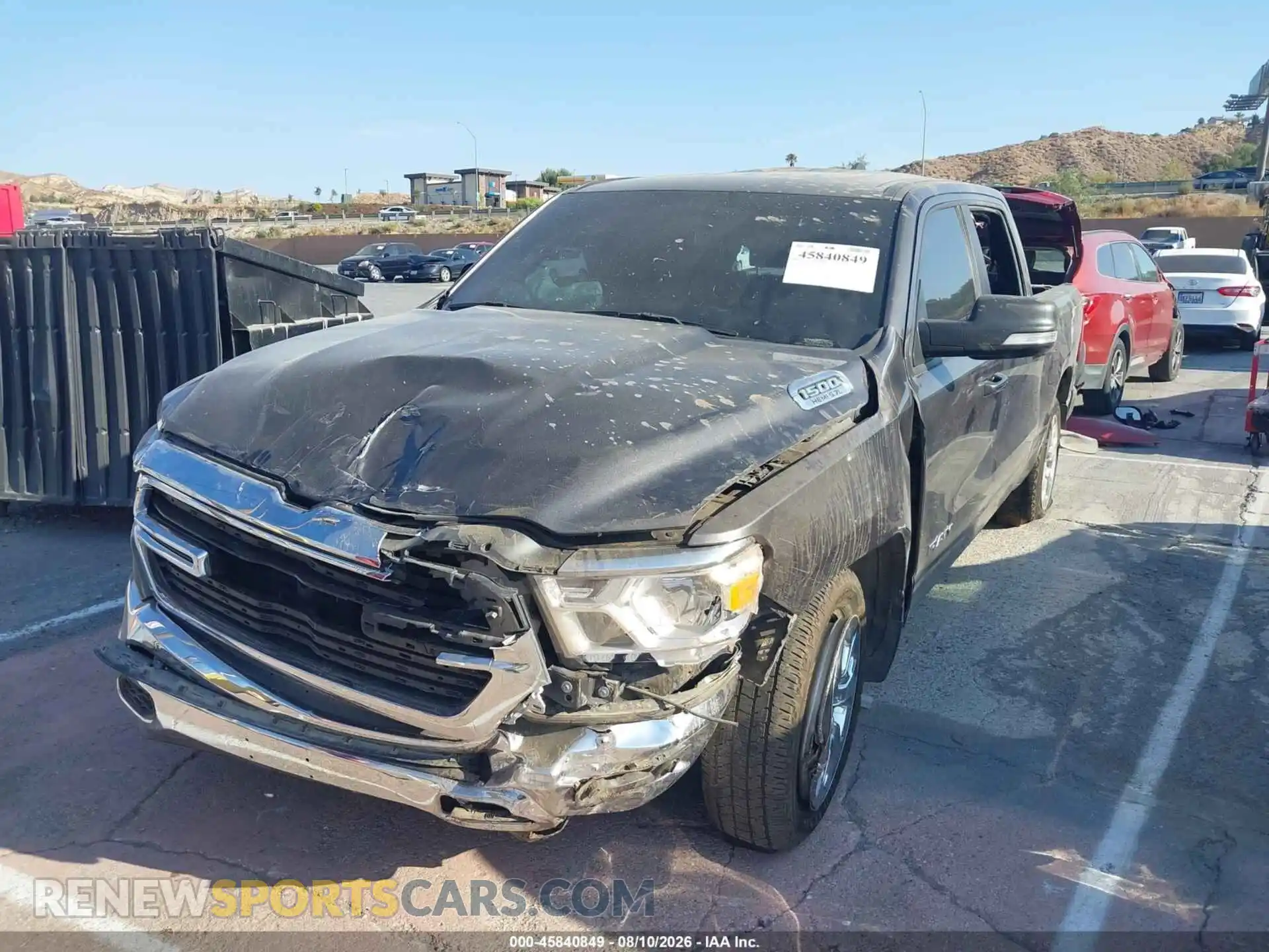 2 Photograph of a damaged car 1C6RREFT2MN502021 RAM 1500 2021