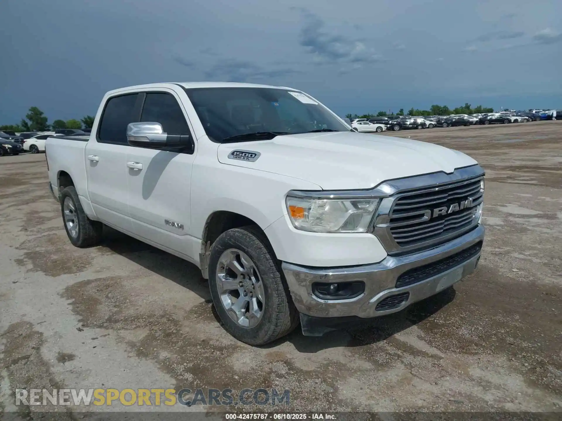 1 Photograph of a damaged car 1C6RREFT2MN502648 RAM 1500 2021