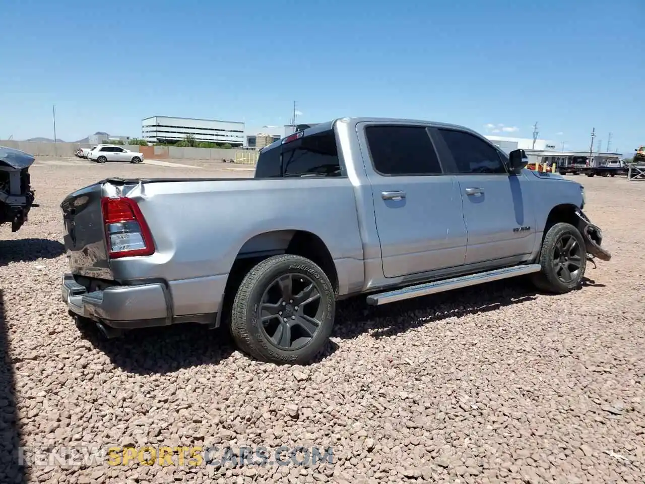 3 Photograph of a damaged car 1C6RREFT2MN590066 RAM 1500 2021
