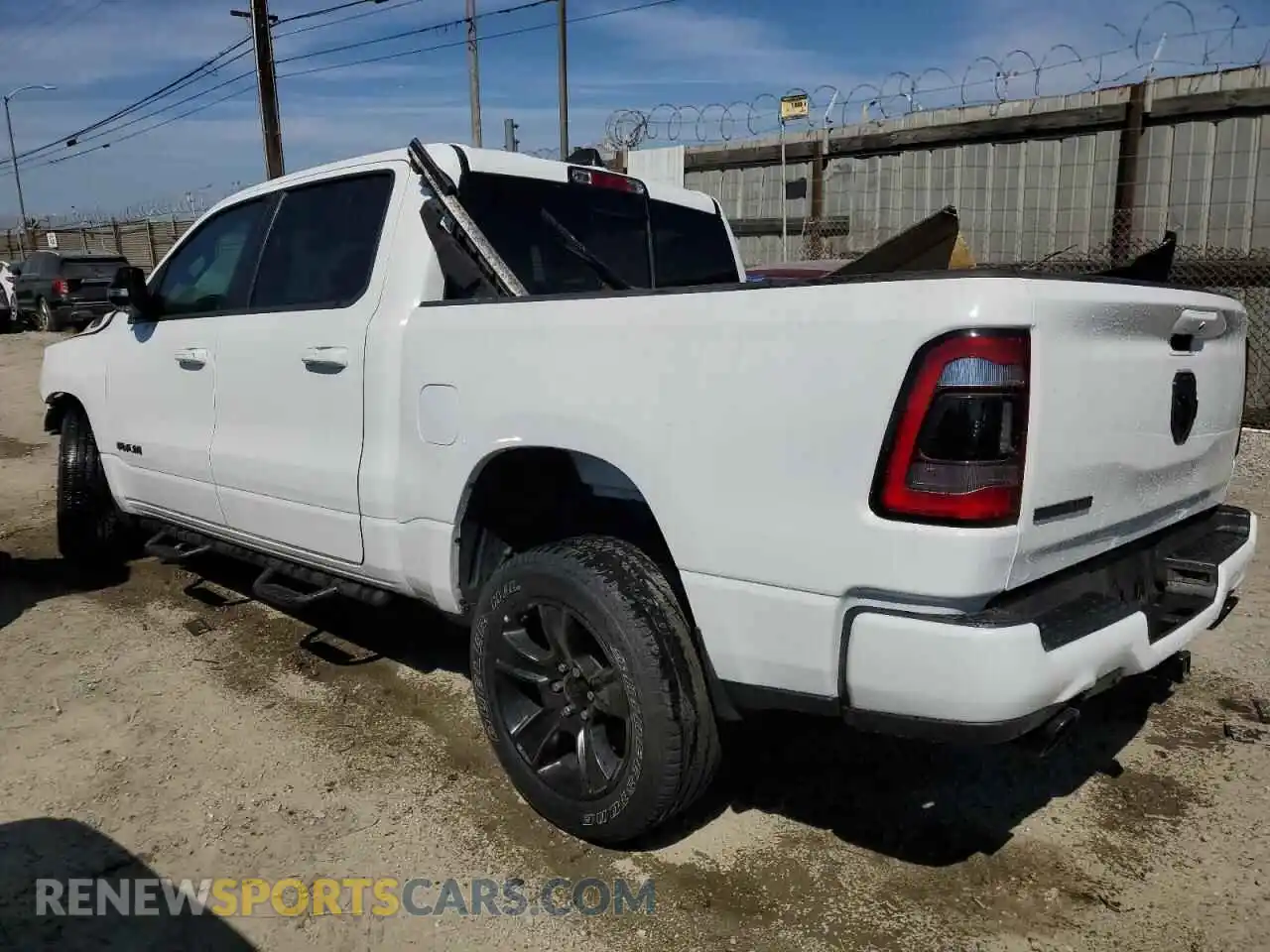 2 Photograph of a damaged car 1C6RREFT2MN660505 RAM 1500 2021