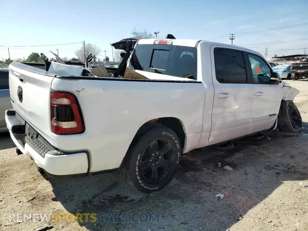 3 Photograph of a damaged car 1C6RREFT2MN660505 RAM 1500 2021