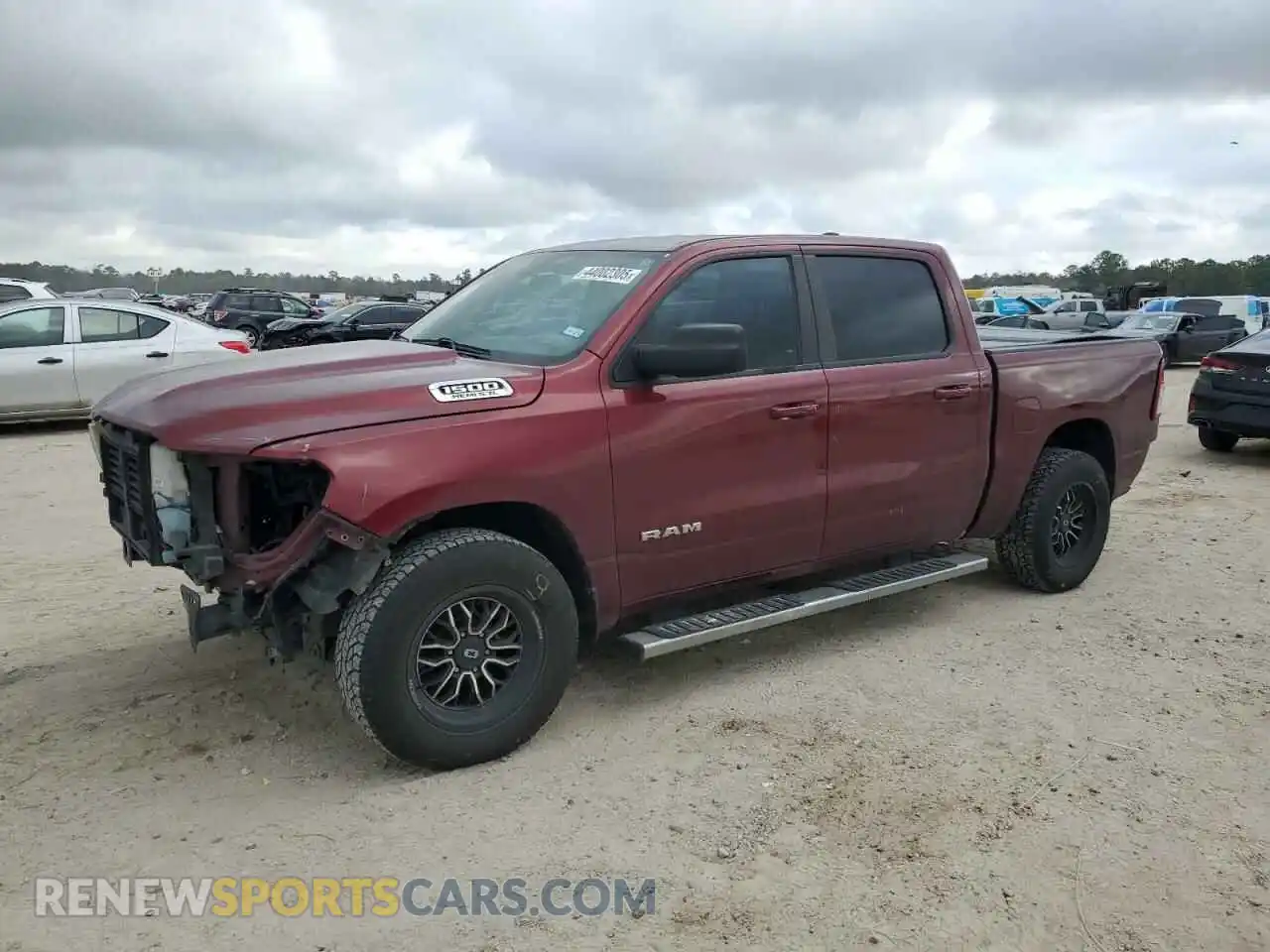 1 Photograph of a damaged car 1C6RREFT3MN543063 RAM 1500 2021