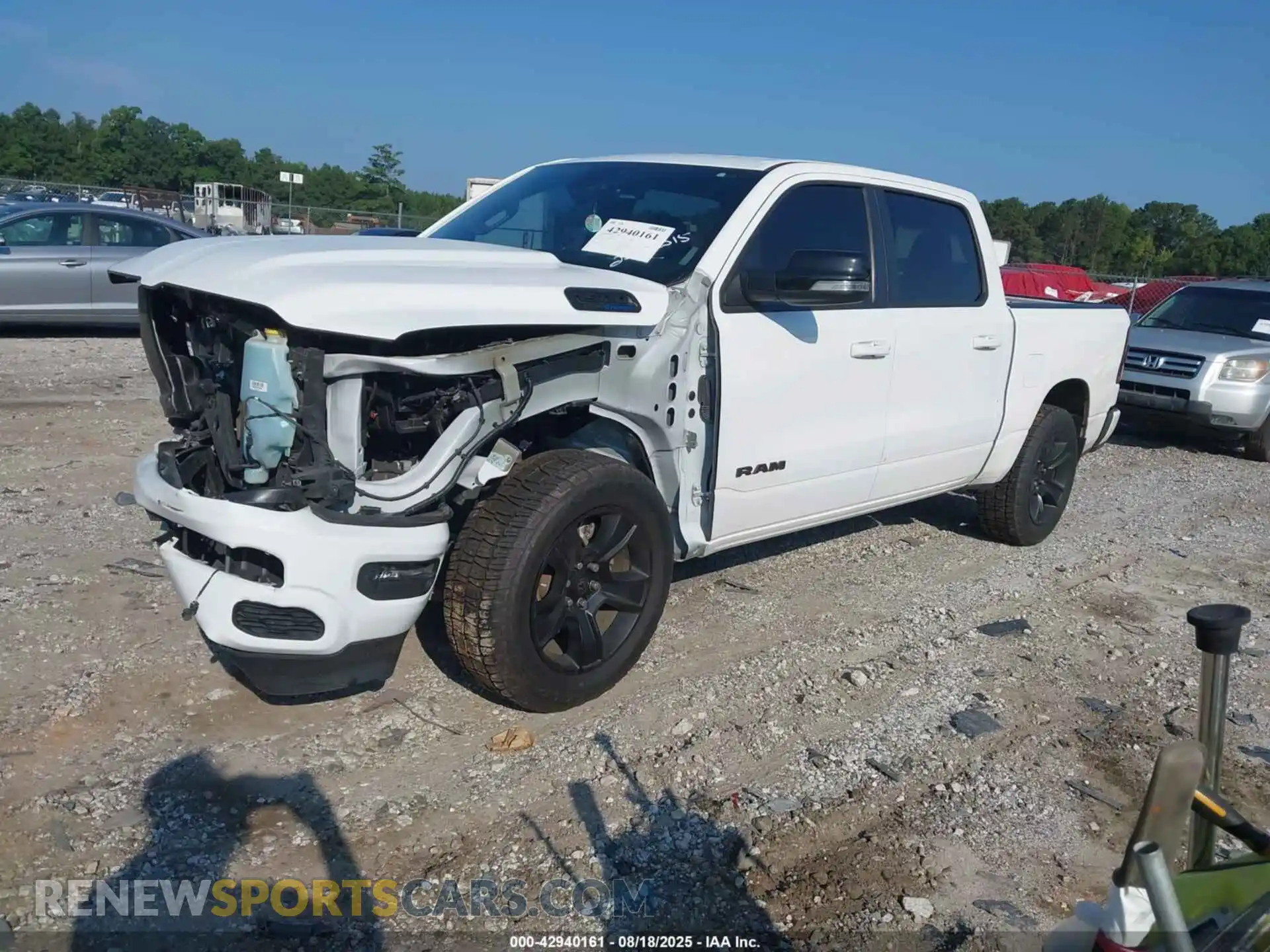 2 Photograph of a damaged car 1C6RREFT3MN629070 RAM 1500 2021