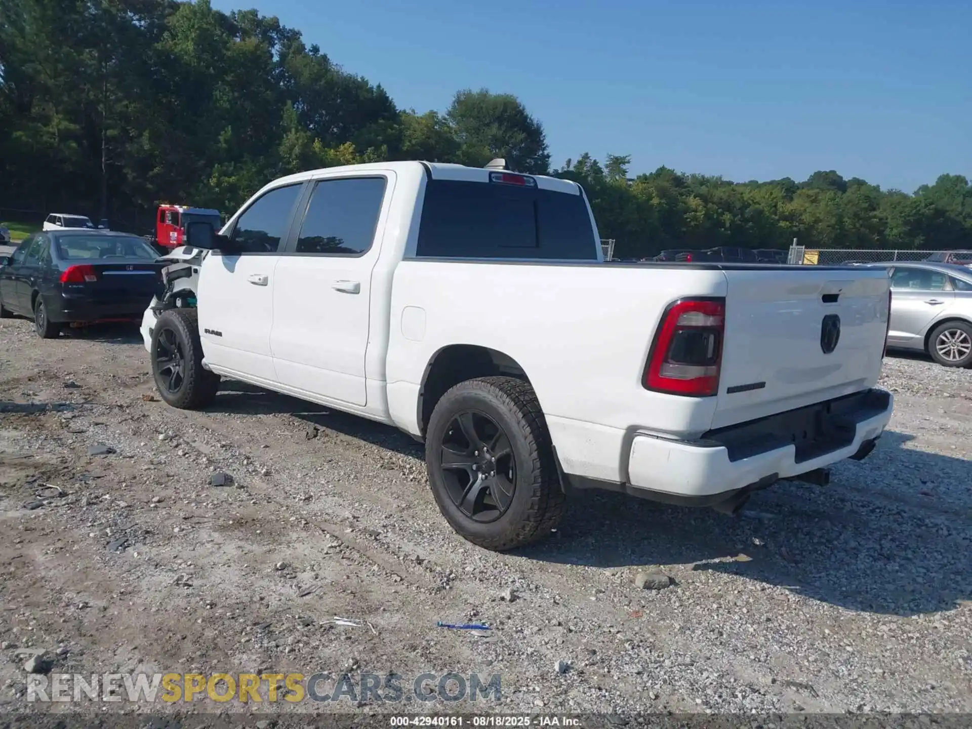 3 Photograph of a damaged car 1C6RREFT3MN629070 RAM 1500 2021