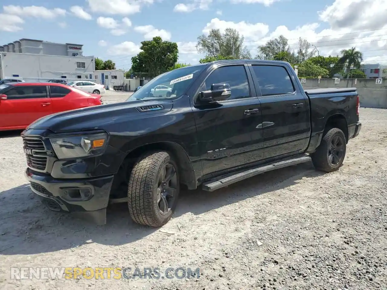 1 Photograph of a damaged car 1C6RREFT3MN690290 RAM 1500 2021