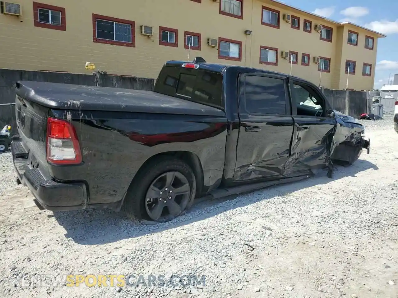 3 Photograph of a damaged car 1C6RREFT3MN690290 RAM 1500 2021