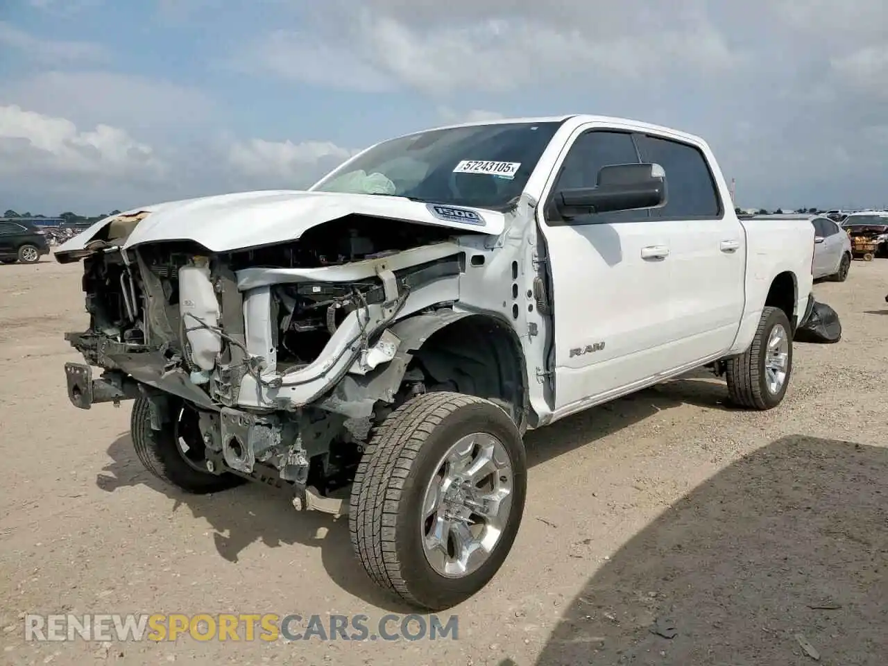 1 Photograph of a damaged car 1C6RREFT3MN743604 RAM 1500 2021