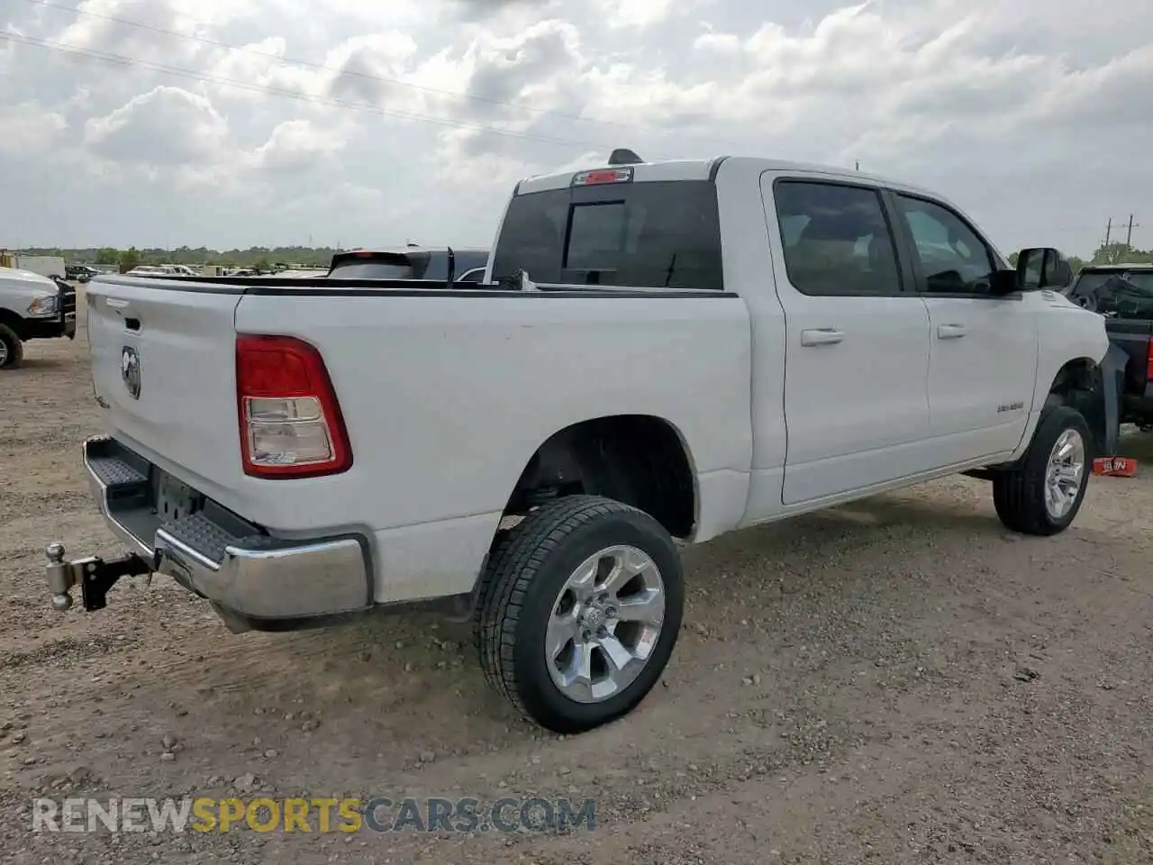 3 Photograph of a damaged car 1C6RREFT3MN743604 RAM 1500 2021