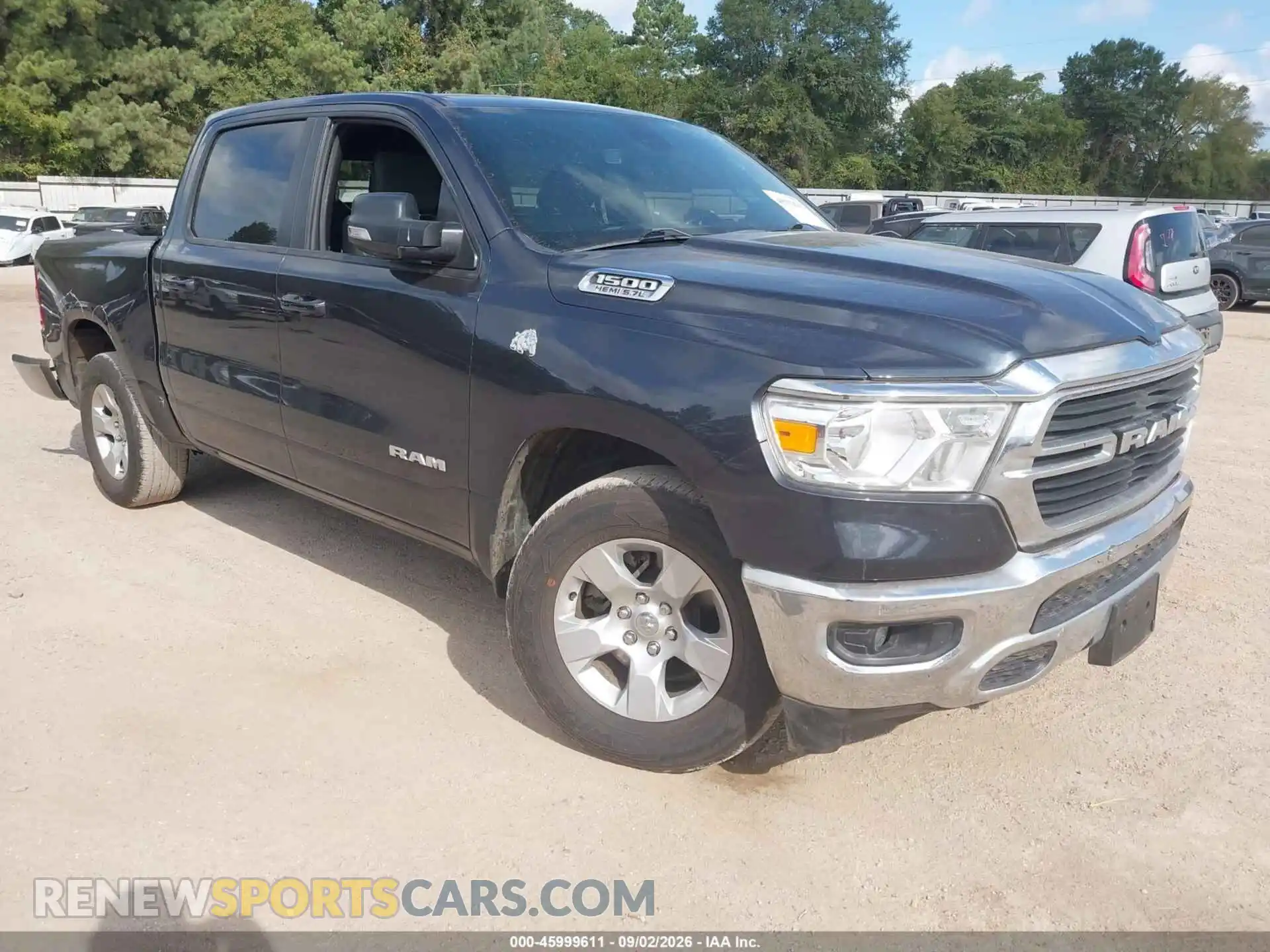1 Photograph of a damaged car 1C6RREFT3MN794505 RAM 1500 2021