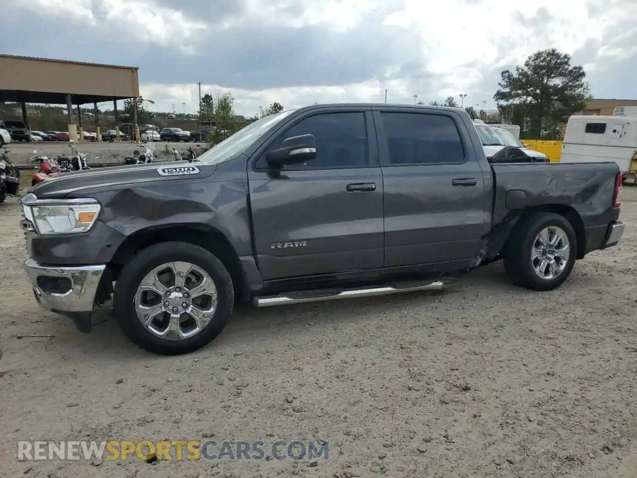 1 Photograph of a damaged car 1C6RREFT4MN543833 RAM 1500 2021