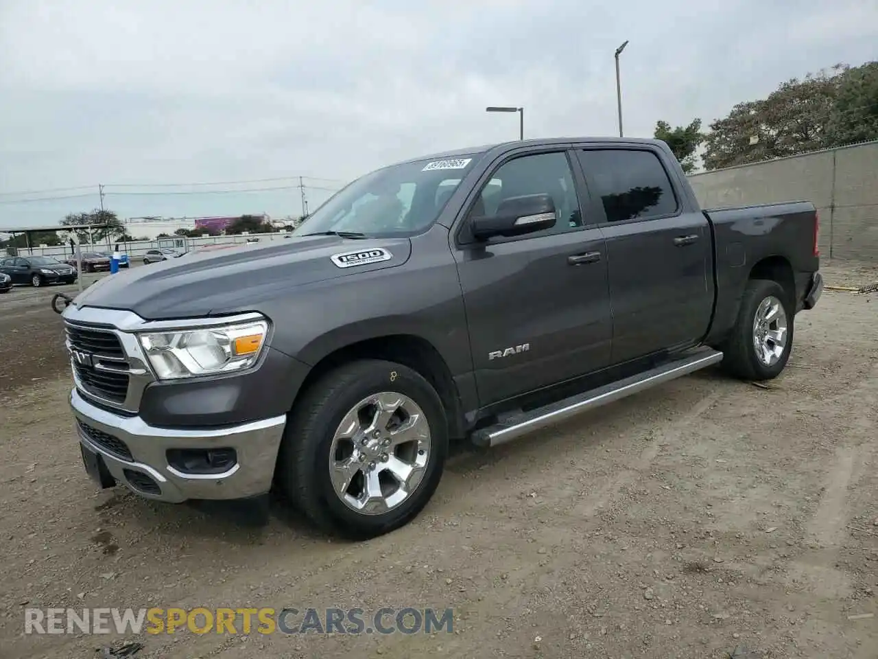 1 Photograph of a damaged car 1C6RREFT4MN631569 RAM 1500 2021