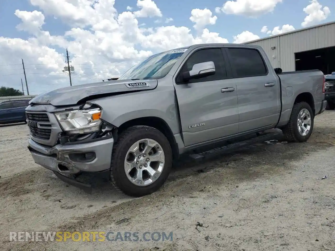 1 Photograph of a damaged car 1C6RREFT4MN690279 RAM 1500 2021
