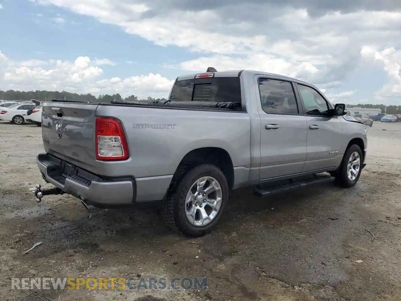 3 Photograph of a damaged car 1C6RREFT4MN690279 RAM 1500 2021