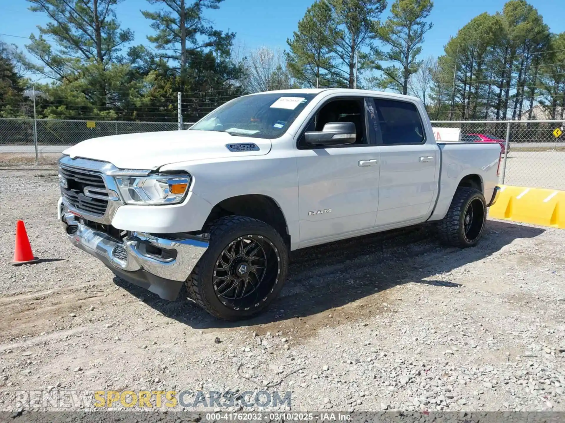 2 Photograph of a damaged car 1C6RREFT4MN708750 RAM 1500 2021