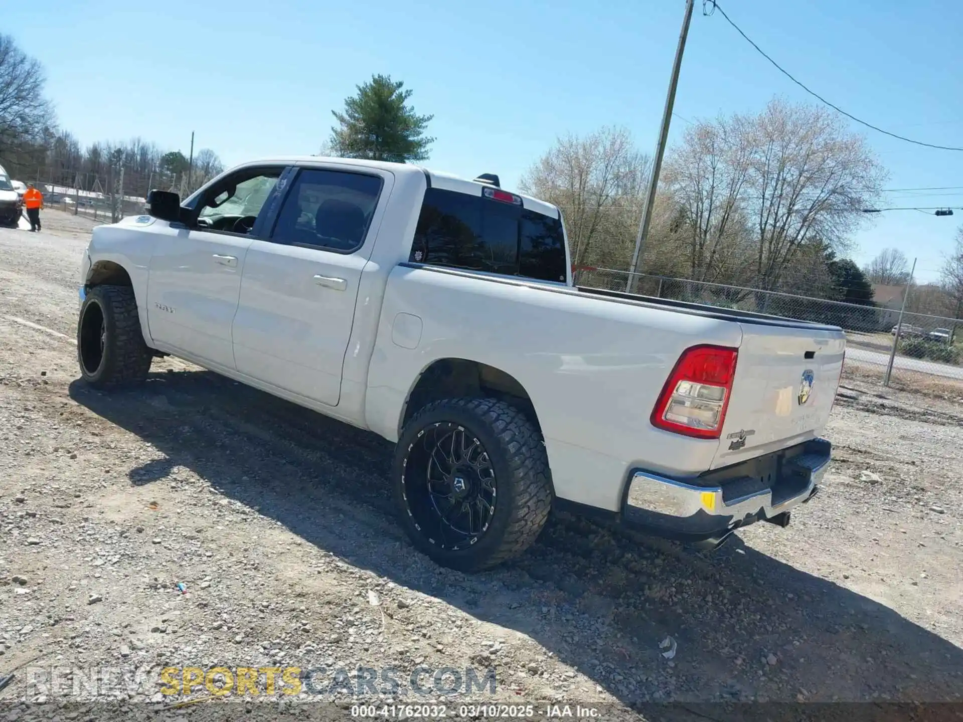 3 Photograph of a damaged car 1C6RREFT4MN708750 RAM 1500 2021