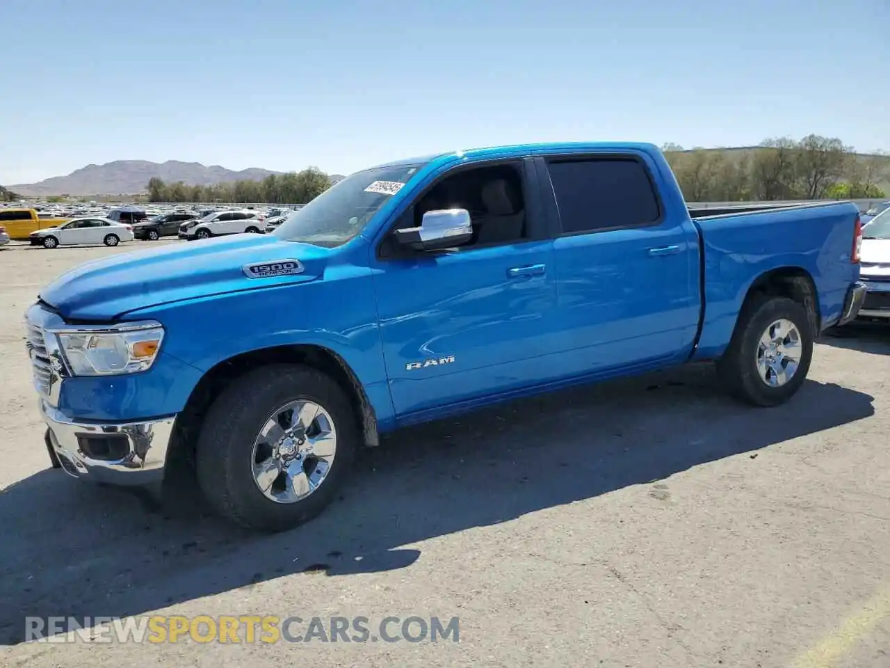 1 Photograph of a damaged car 1C6RREFT4MN752943 RAM 1500 2021
