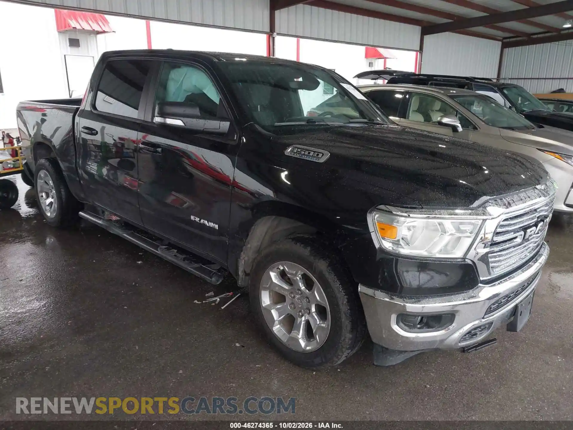 1 Photograph of a damaged car 1C6RREFT5MN661700 RAM 1500 2021