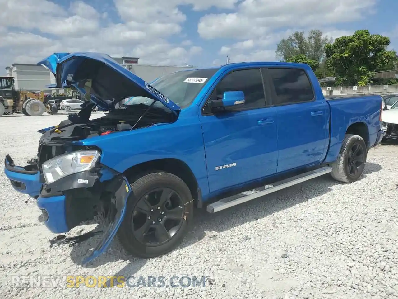 1 Photograph of a damaged car 1C6RREFT5MN690677 RAM 1500 2021