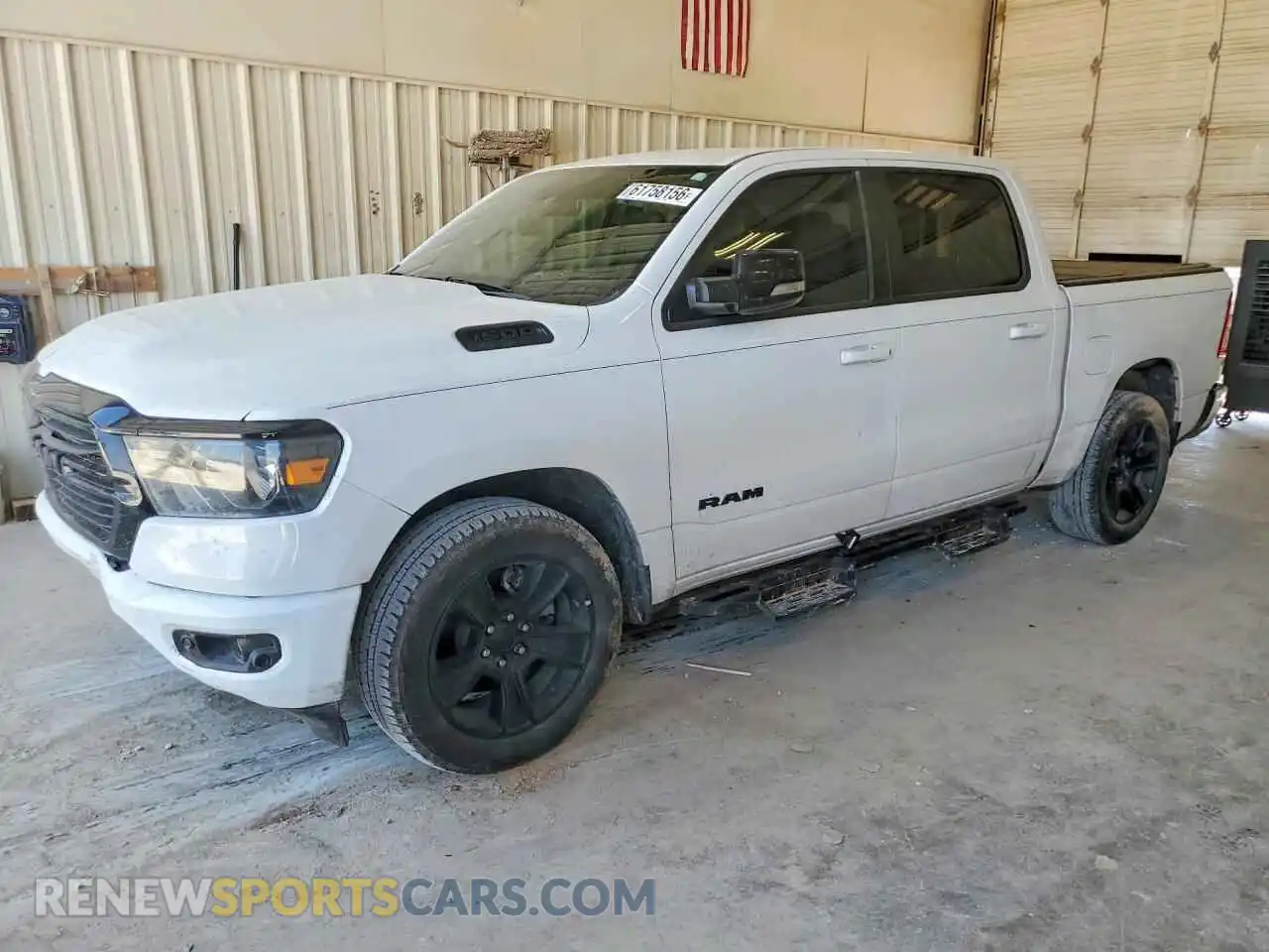 1 Photograph of a damaged car 1C6RREFT5MN709910 RAM 1500 2021