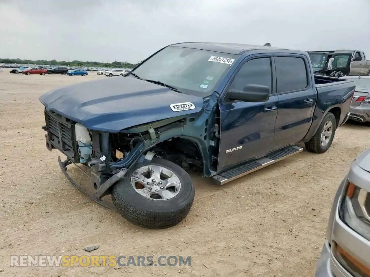 1 Photograph of a damaged car 1C6RREFT5MN835751 RAM 1500 2021