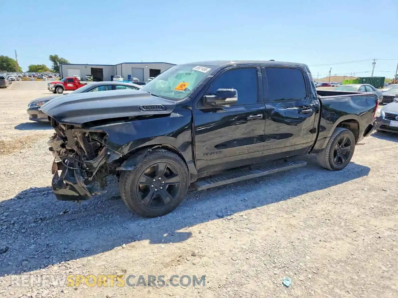 1 Photograph of a damaged car 1C6RREFT7MN661214 RAM 1500 2021