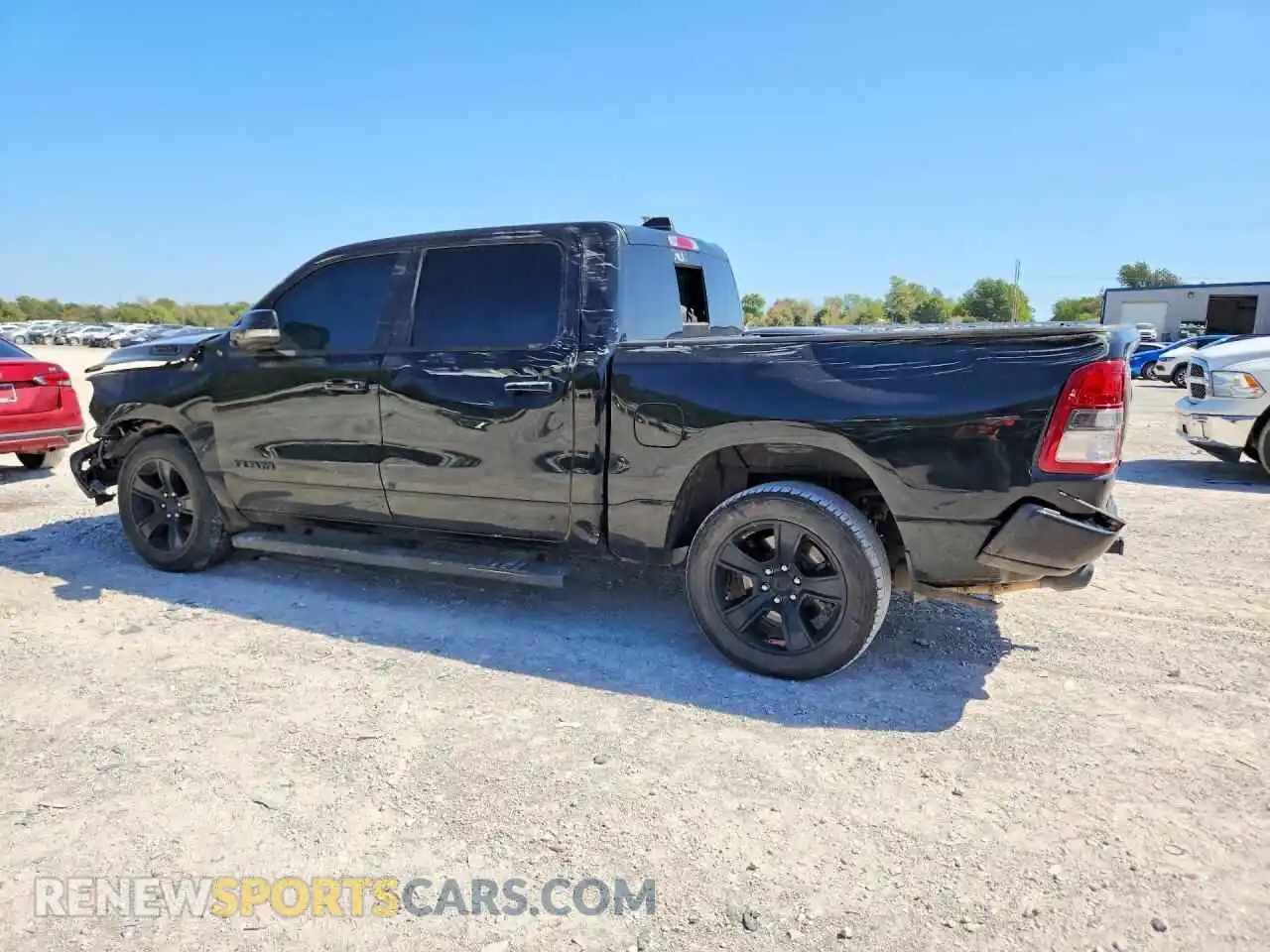 2 Photograph of a damaged car 1C6RREFT7MN661214 RAM 1500 2021